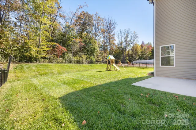 a view of a playground with a swimming pool