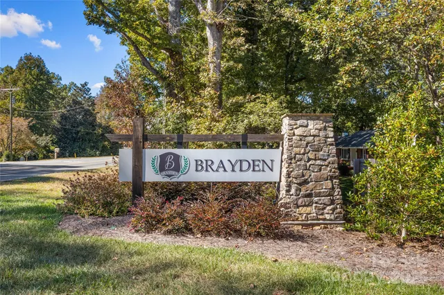 a sign that is on the side of a road