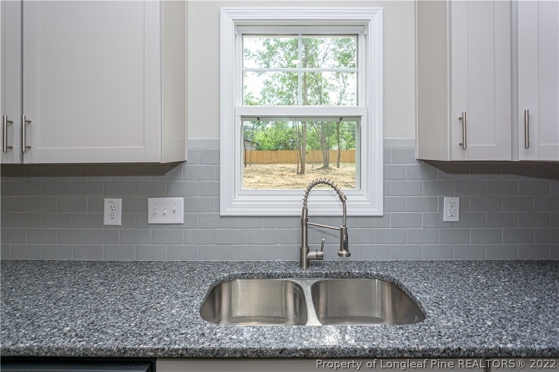 1628 Strickland Bridge Road Fayetteville, NC 28304 - Photo 15 of 34 a close view of sink and tap