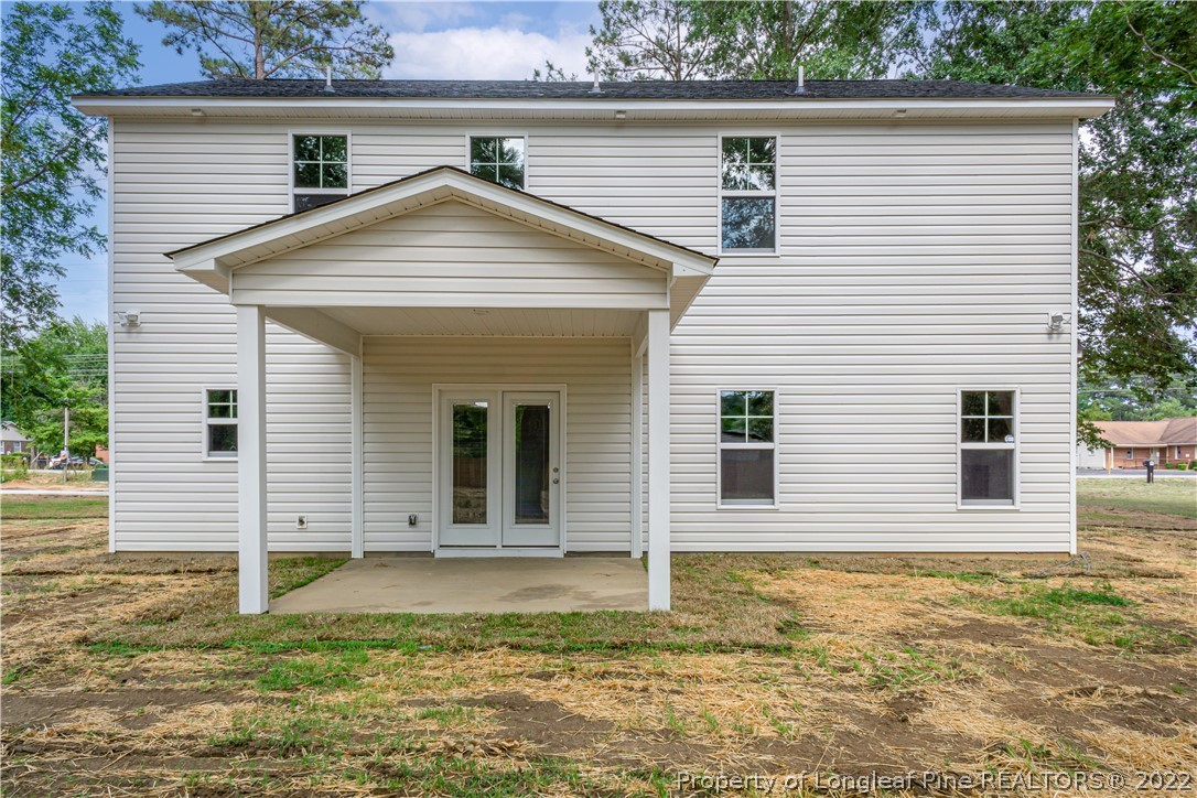 1628 Strickland Bridge Road Fayetteville, NC 28304 - Photo 2 of 34 a view of a house with a yard