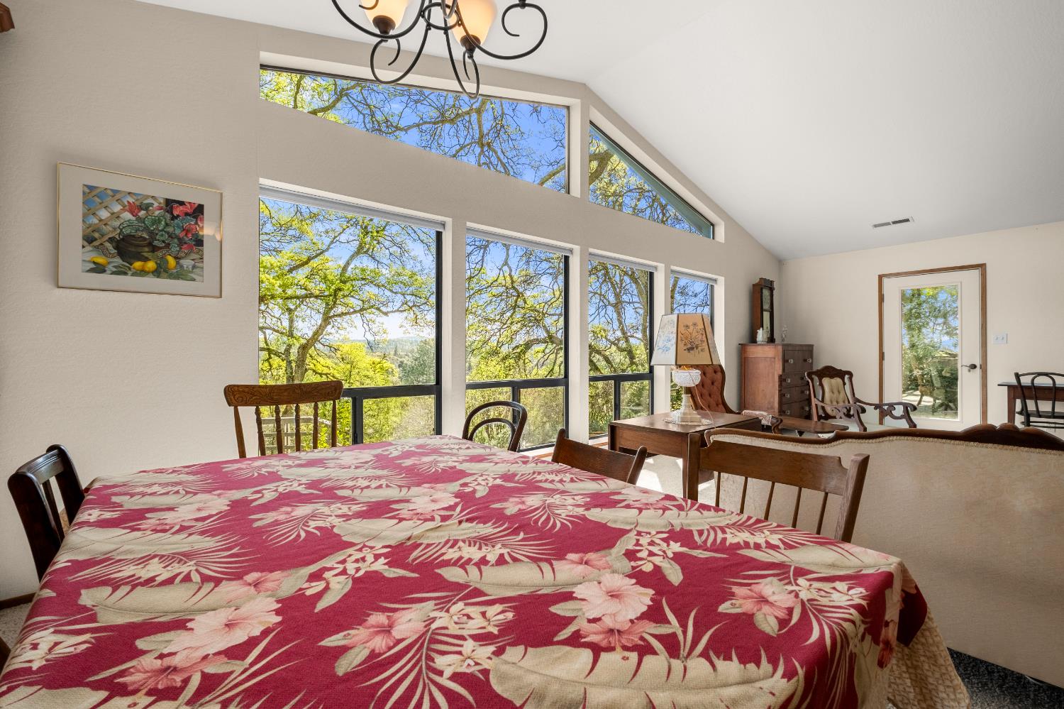 3099 Briw Road Placerville, CA 95667 - Photo 19 of 47 a bedroom with a bed a large window with table and chairs