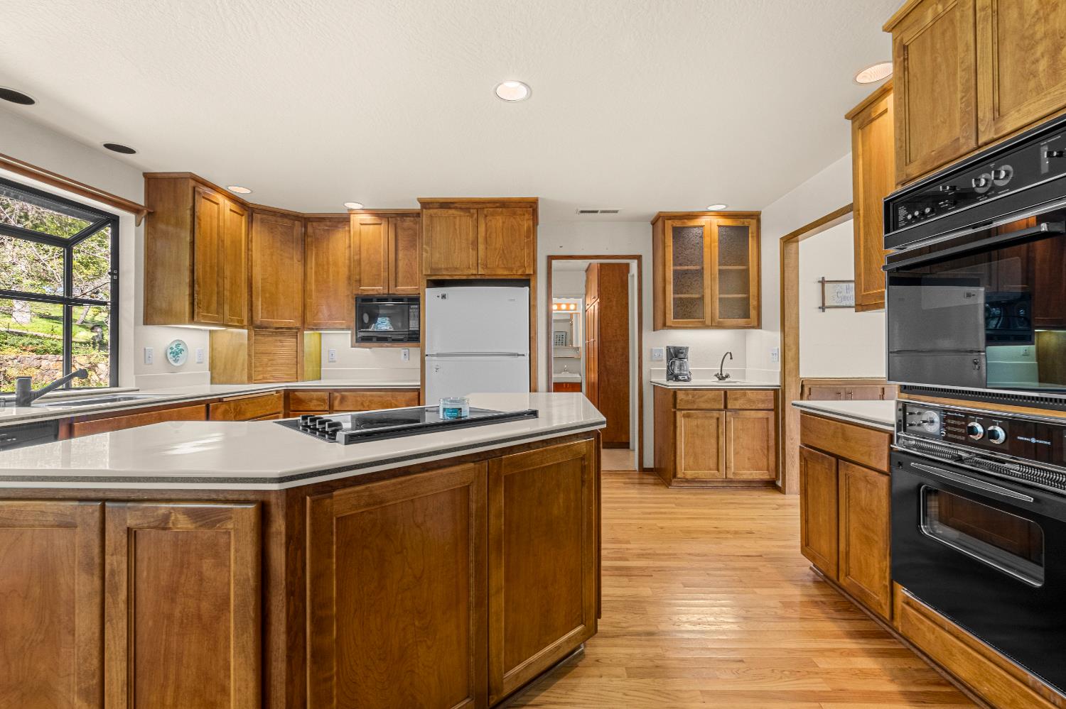 3099 Briw Road Placerville, CA 95667 - Photo 26 of 47 a kitchen with stainless steel appliances sink stove refrigerator and cabinets