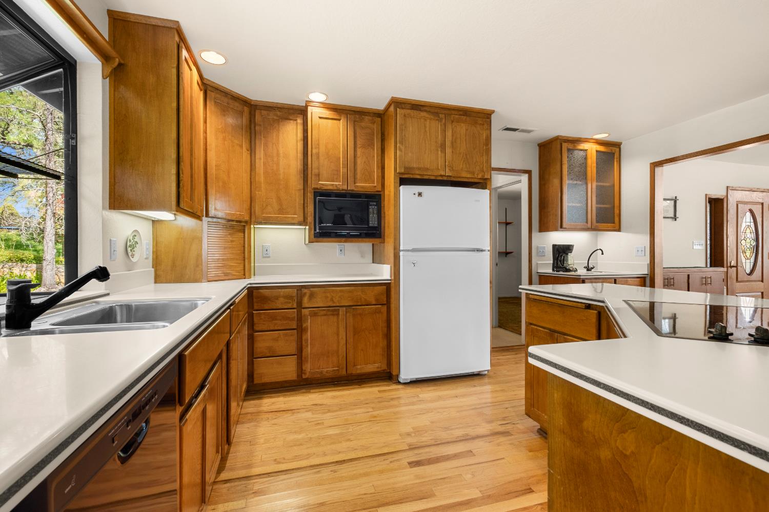 3099 Briw Road Placerville, CA 95667 - Photo 29 of 47 a kitchen that has a sink and a refrigerator