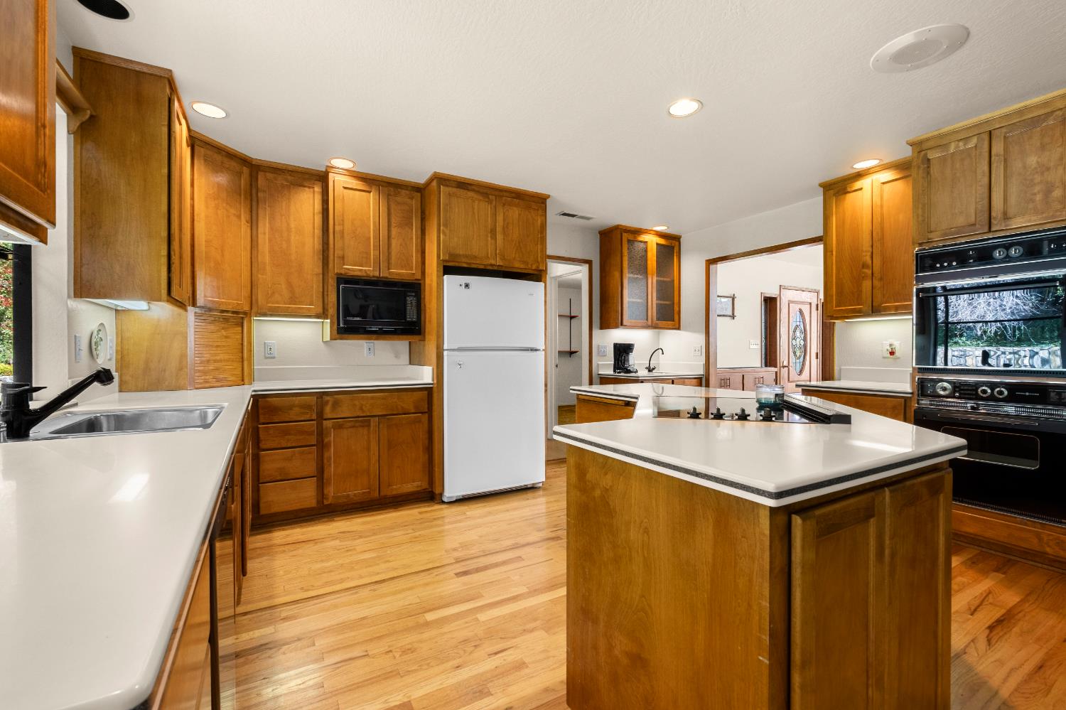 3099 Briw Road Placerville, CA 95667 - Photo 30 of 47 a kitchen with stainless steel appliances granite countertop a sink stove and refrigerator