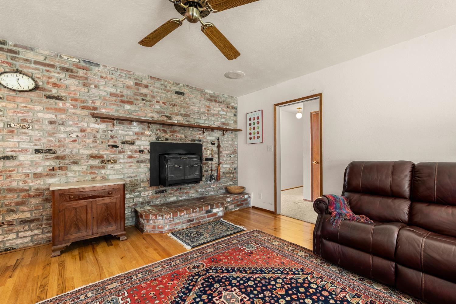 3099 Briw Road Placerville, CA 95667 - Photo 31 of 47 a living room with furniture and a fireplace