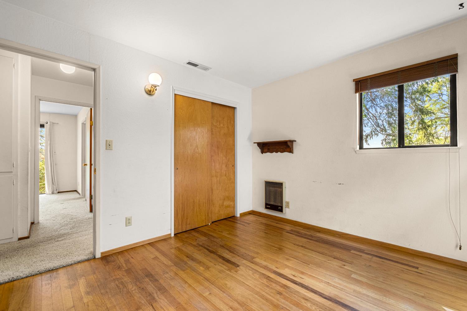 3099 Briw Road Placerville, CA 95667 - Photo 37 of 47 a view of empty room with wooden floor and fan