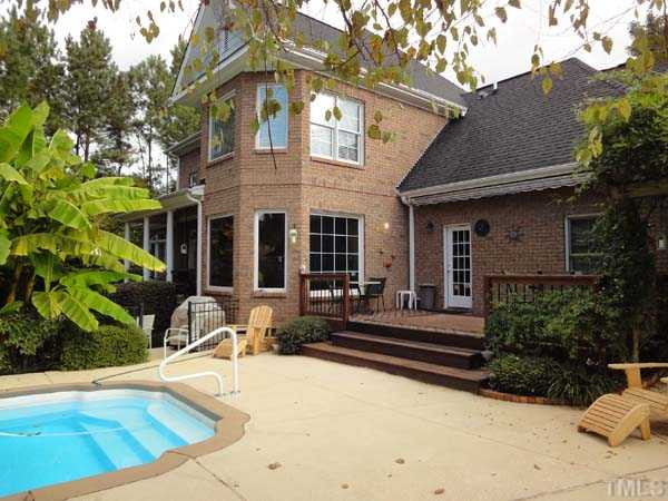 8016 Millenium Drive Raleigh, NC 27614 - Photo 23 of 25 View of back of home looking from pool house.