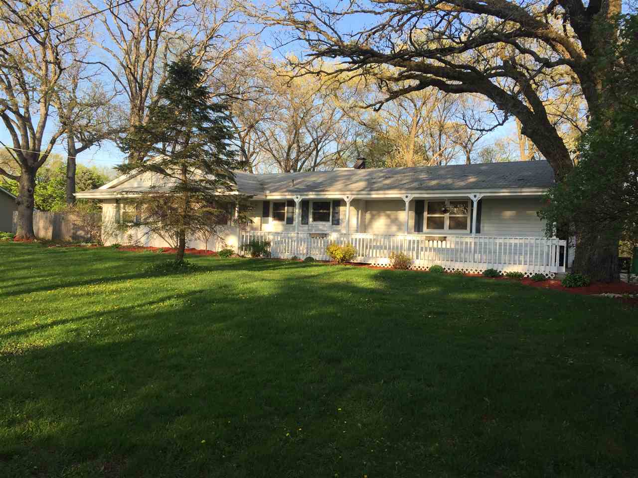10619 Grover Oaks Road Roscoe, IL 61073 - Photo 1 of 24 a front view of house with yard and green space