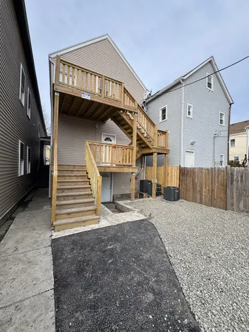 a view of a house with a street