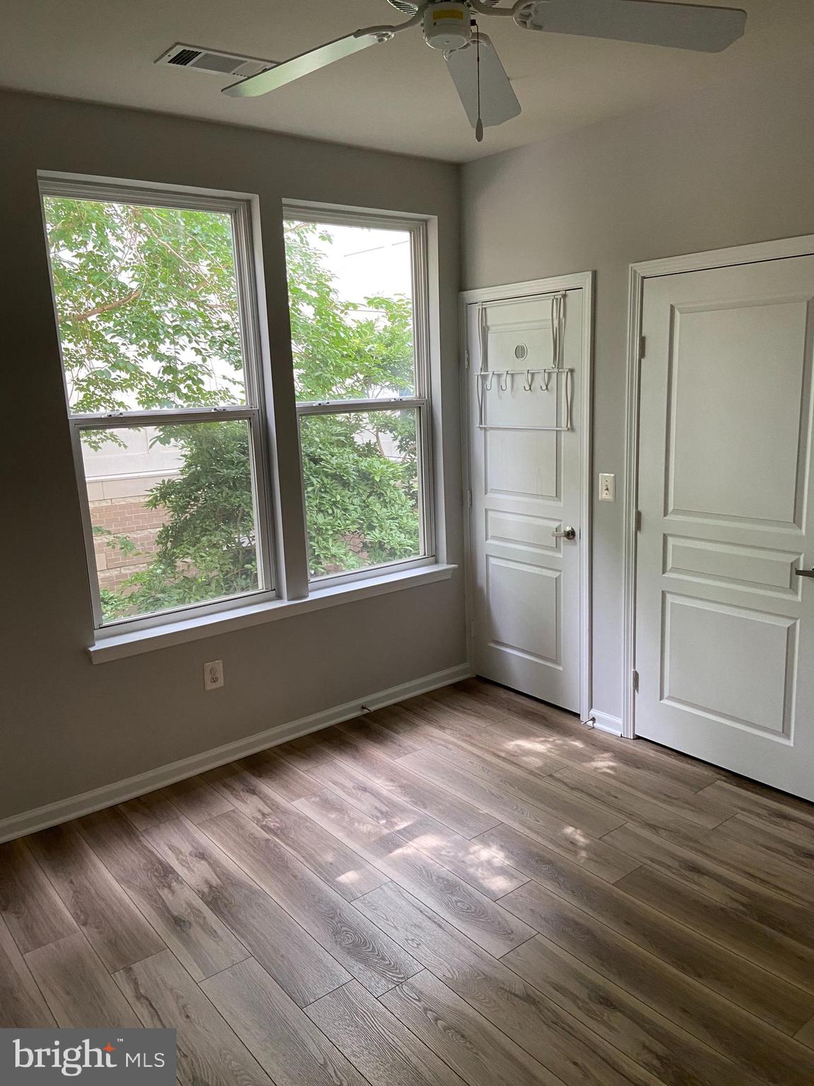 12001 Market Street, Unit 206 Reston, VA 20190 - Photo 11 of 22 Owner's Suite with Walk-in Closet