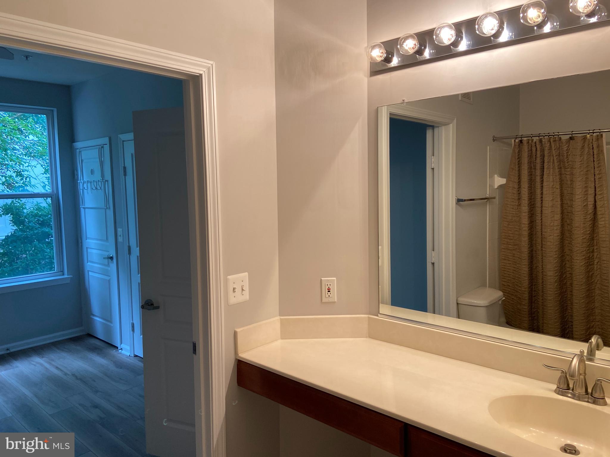 12001 Market Street, Unit 206 Reston, VA 20190 - Photo 15 of 22 Full Bathroom with Large Vanity