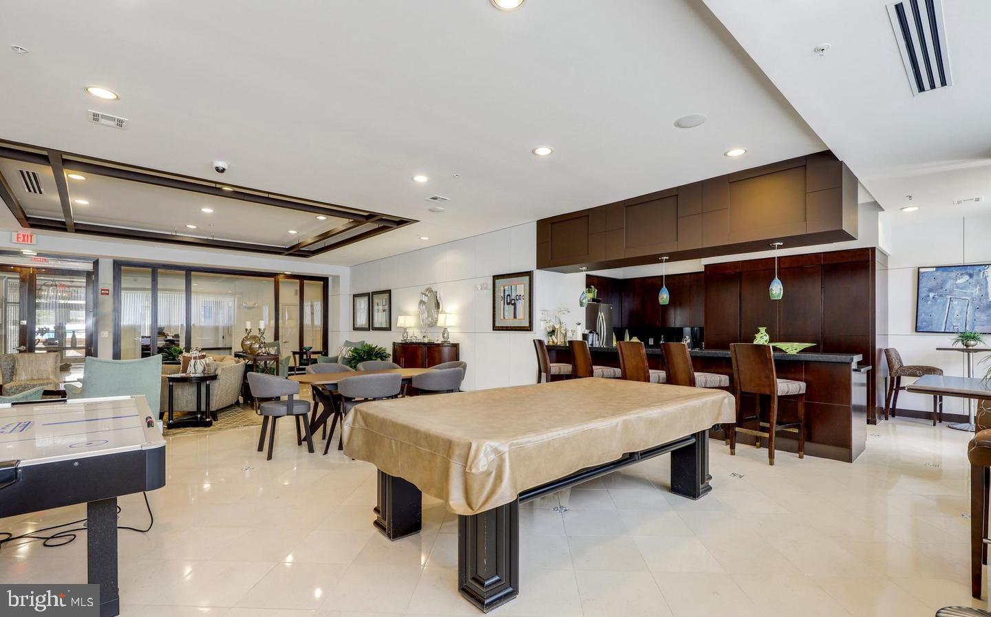 12001 Market Street, Unit 206 Reston, VA 20190 - Photo 20 of 22 Entertain your Guests in the Billiard/Game Room