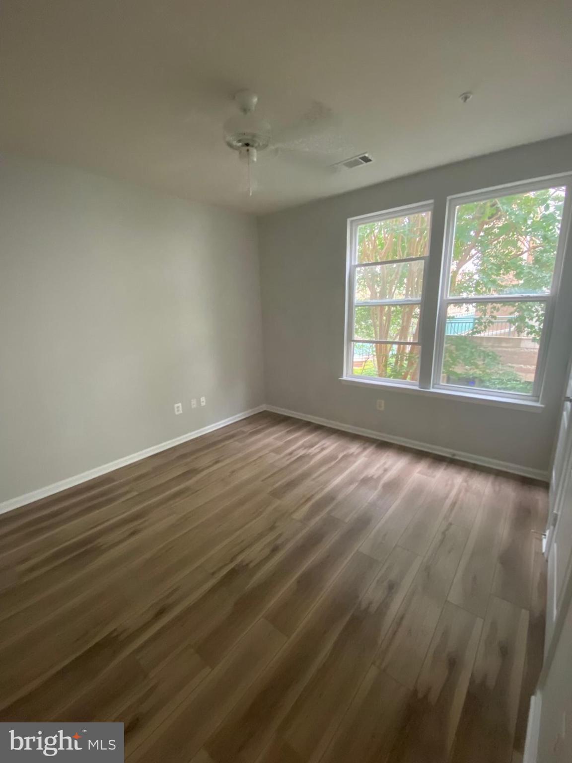 12001 Market Street, Unit 206 Reston, VA 20190 - Photo 10 of 22 Owner's Suite w/ Custom Paint Throughout