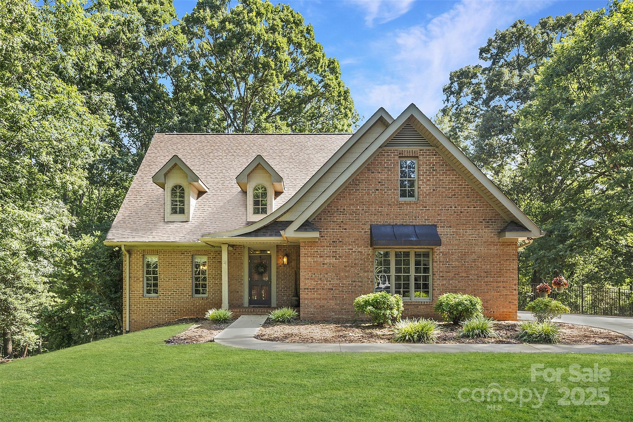 104 Tallwood Drive Shelby, NC 28152 - Photo 1 of 41 a front view of a house with a yard and green space