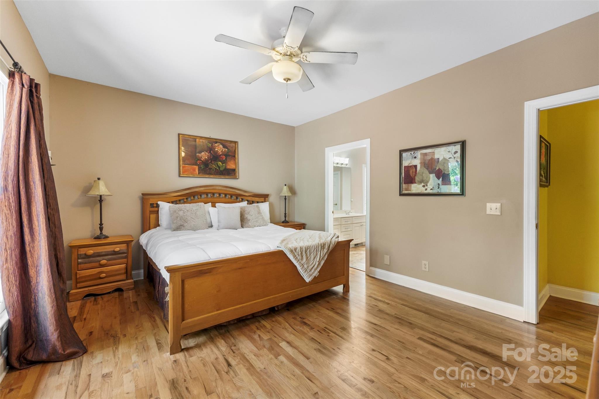 104 Tallwood Drive Shelby, NC 28152 - Photo 14 of 41 a bedroom with a bed chandelier and a window
