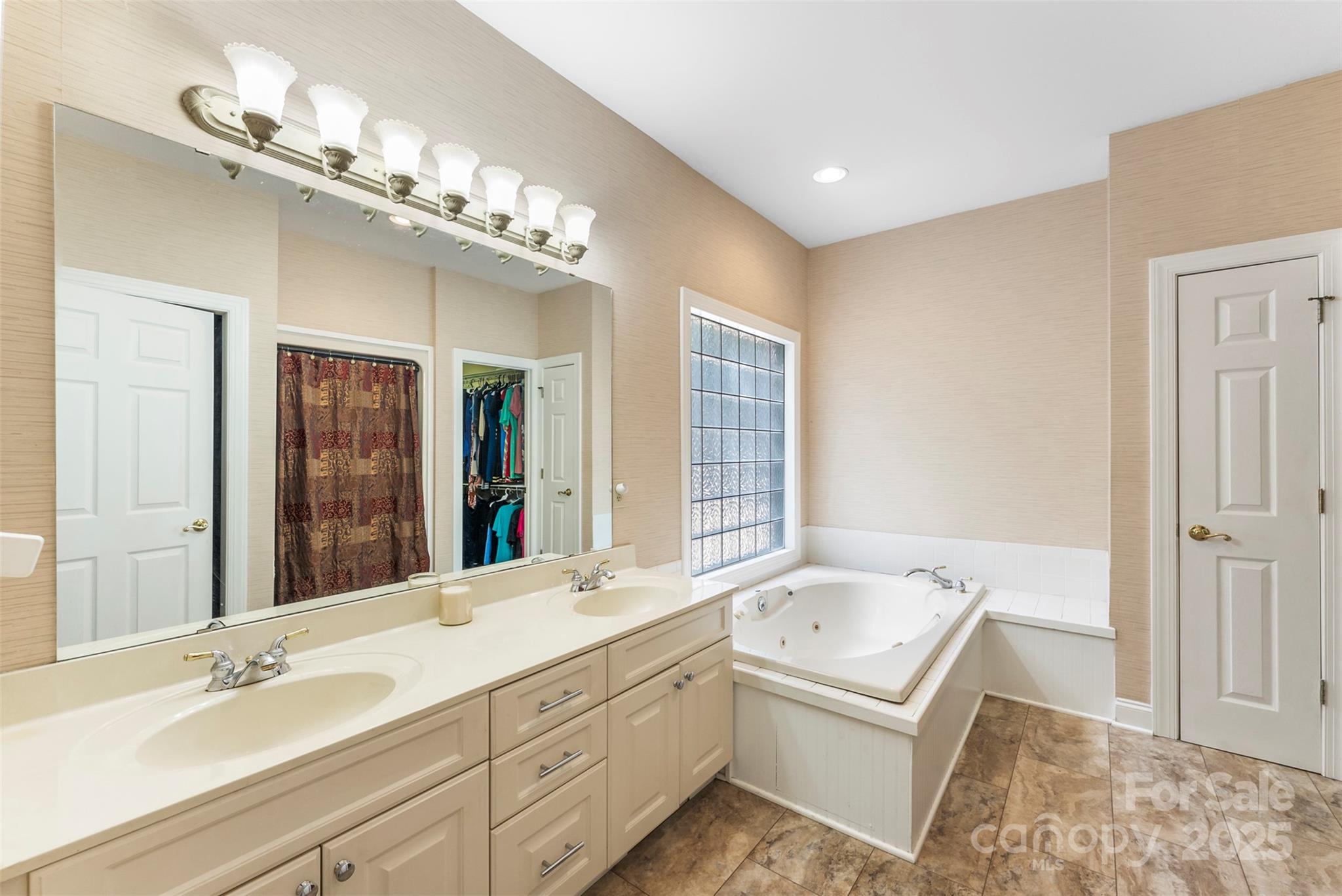 104 Tallwood Drive Shelby, NC 28152 - Photo 16 of 41 a bathroom with a tub sink and mirror