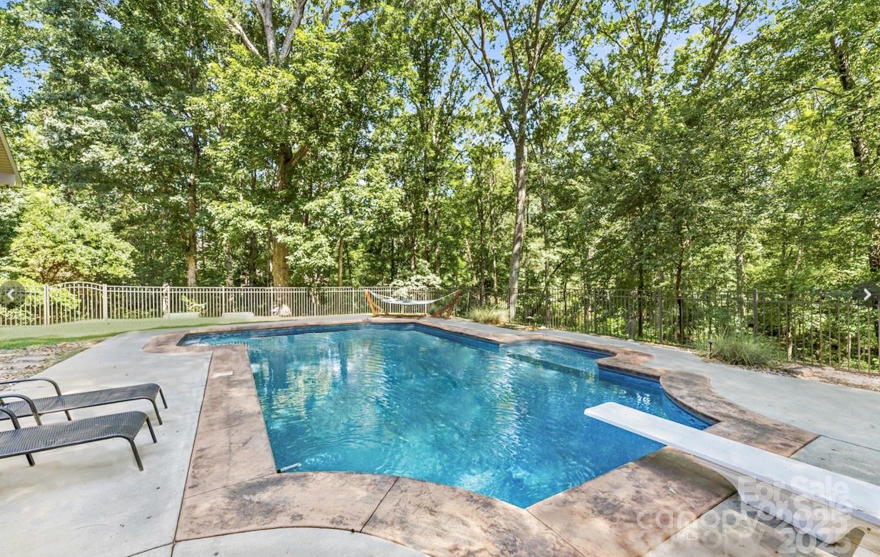 104 Tallwood Drive Shelby, NC 28152 - Photo 36 of 41 a view of a swimming pool with a yard
