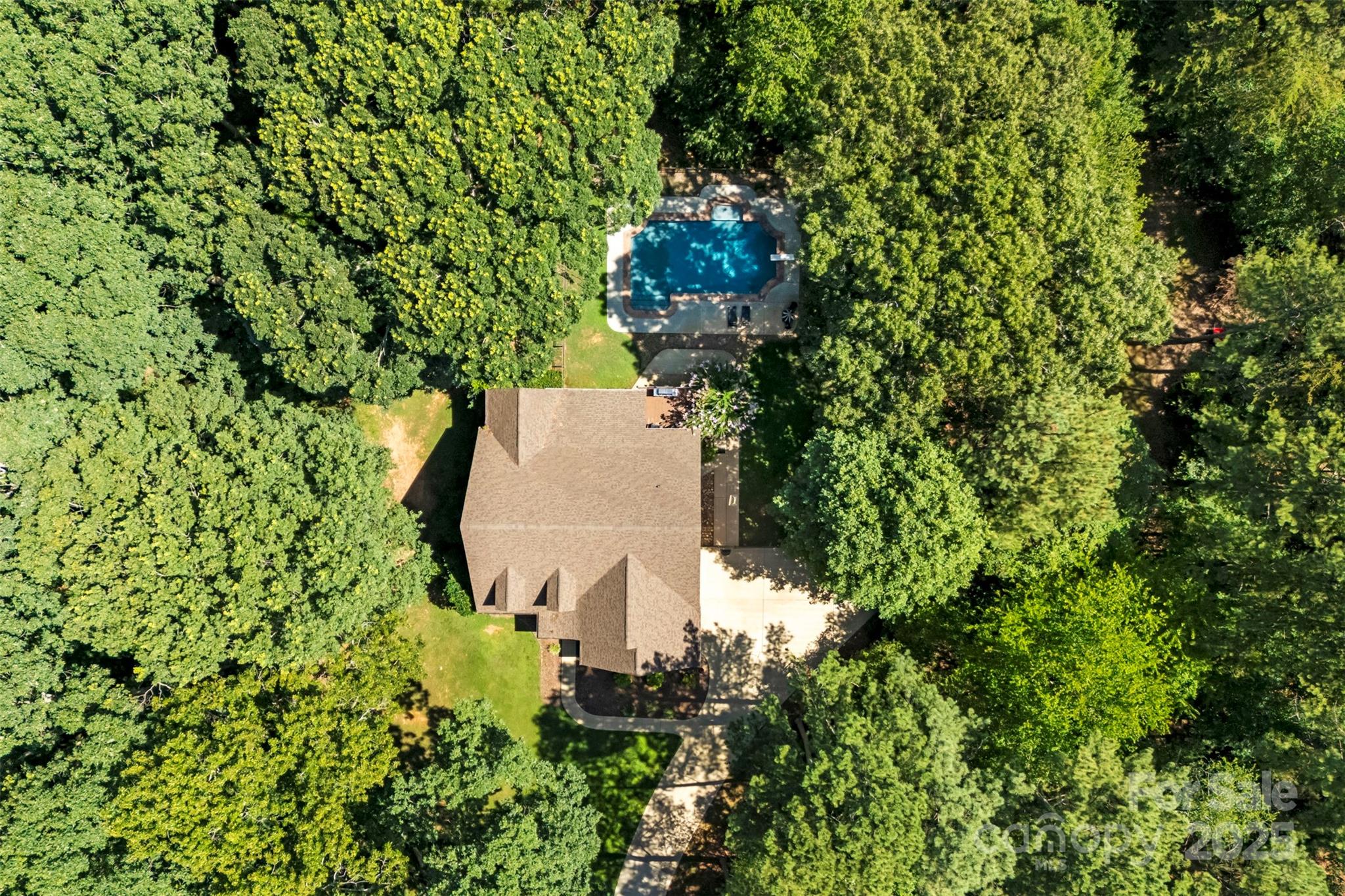 104 Tallwood Drive Shelby, NC 28152 - Photo 40 of 41 an aerial view of a house with a yard and trees