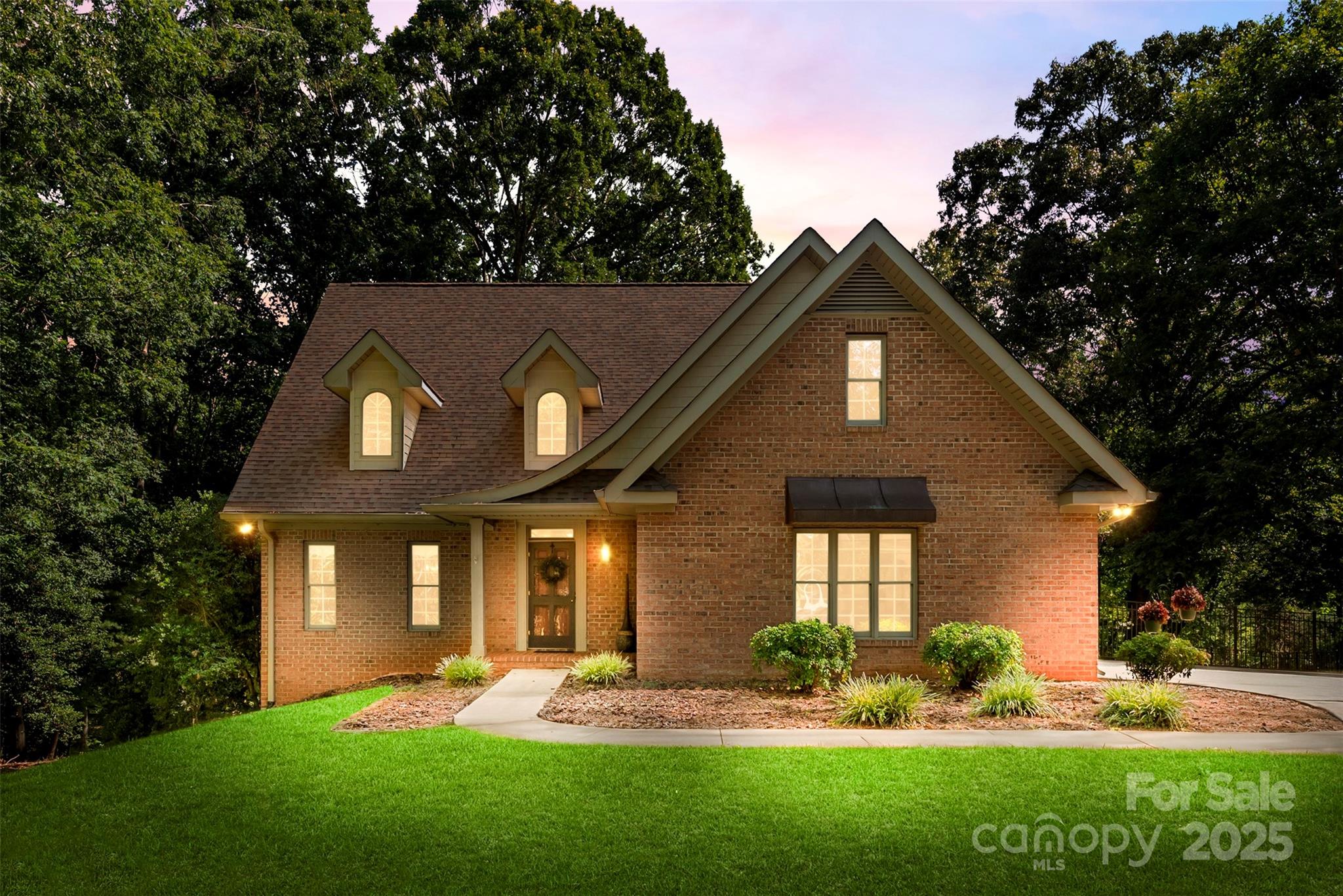 104 Tallwood Drive Shelby, NC 28152 - Photo 41 of 41 a front view of a house with garden