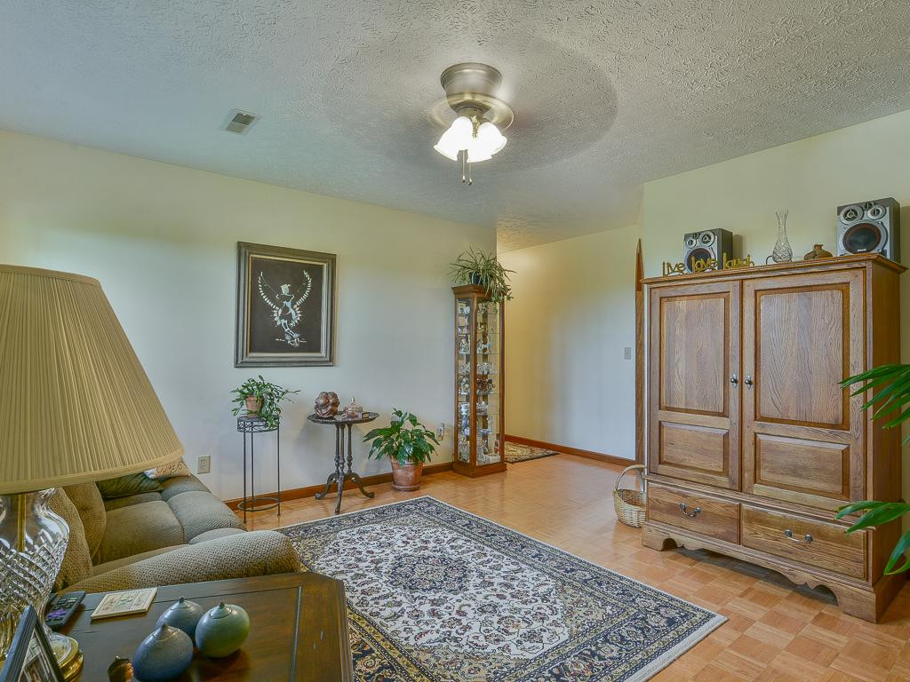 297 Leesburg Road Telford, TN 37690 - Photo 5 of 36 Living Room w parquet floor