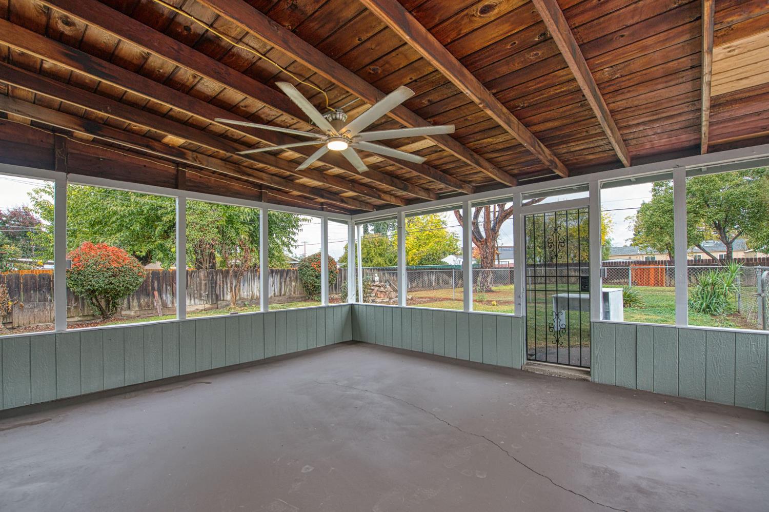 517 Rotan Avenue Madera, CA 93637 - Photo 23 of 32 a view of room with furniture and floor to ceiling window