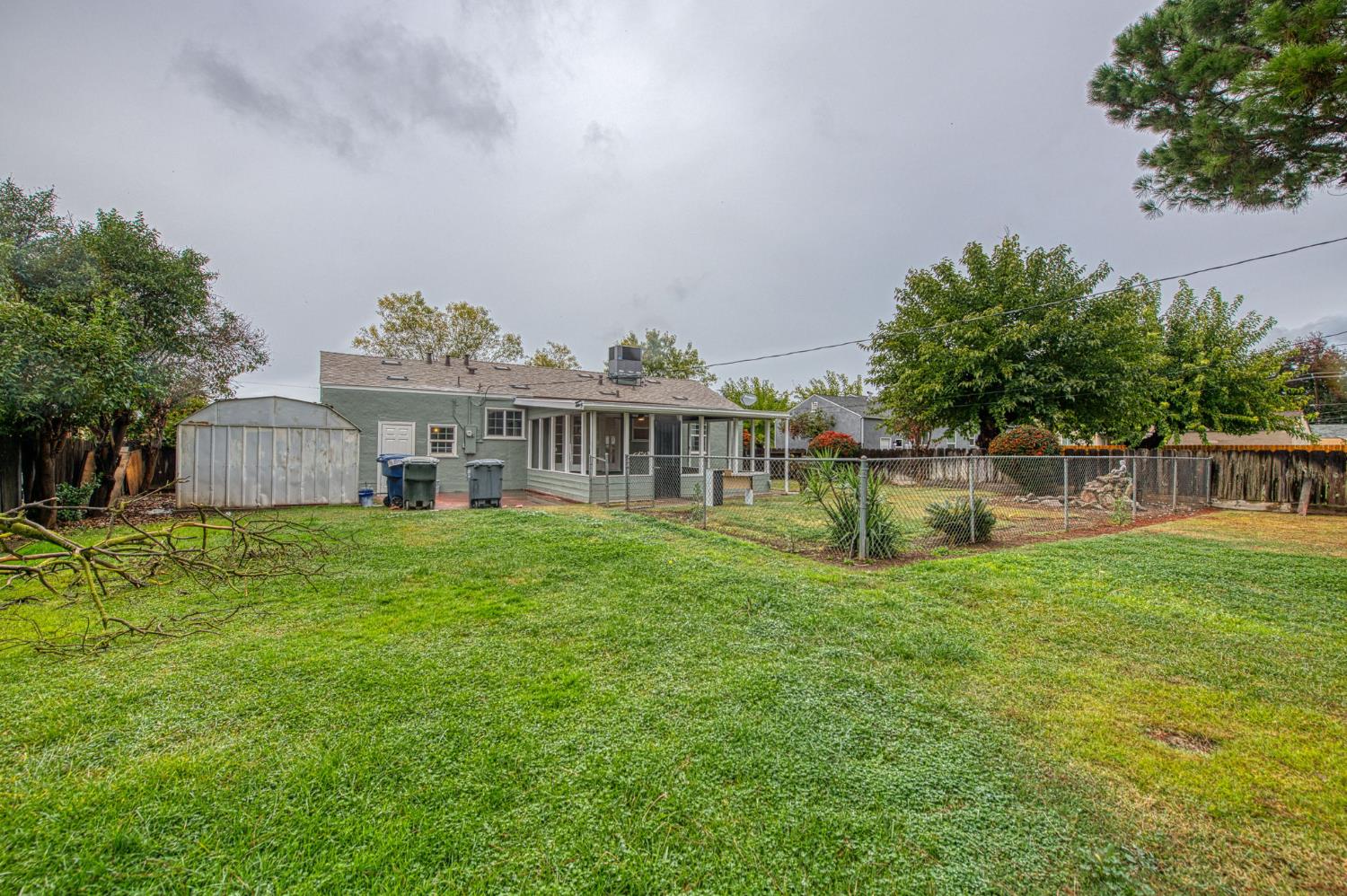 517 Rotan Avenue Madera, CA 93637 - Photo 29 of 32 a view of a house with backyard and sitting area