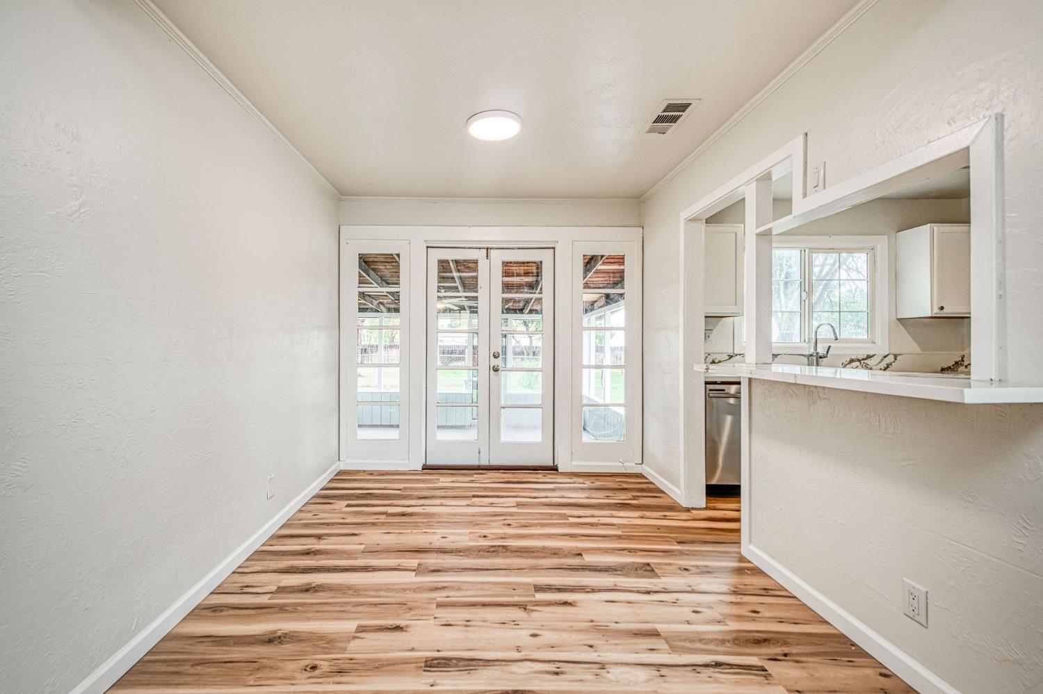 517 Rotan Avenue Madera, CA 93637 - Photo 10 of 32 a view of a bedroom with windows