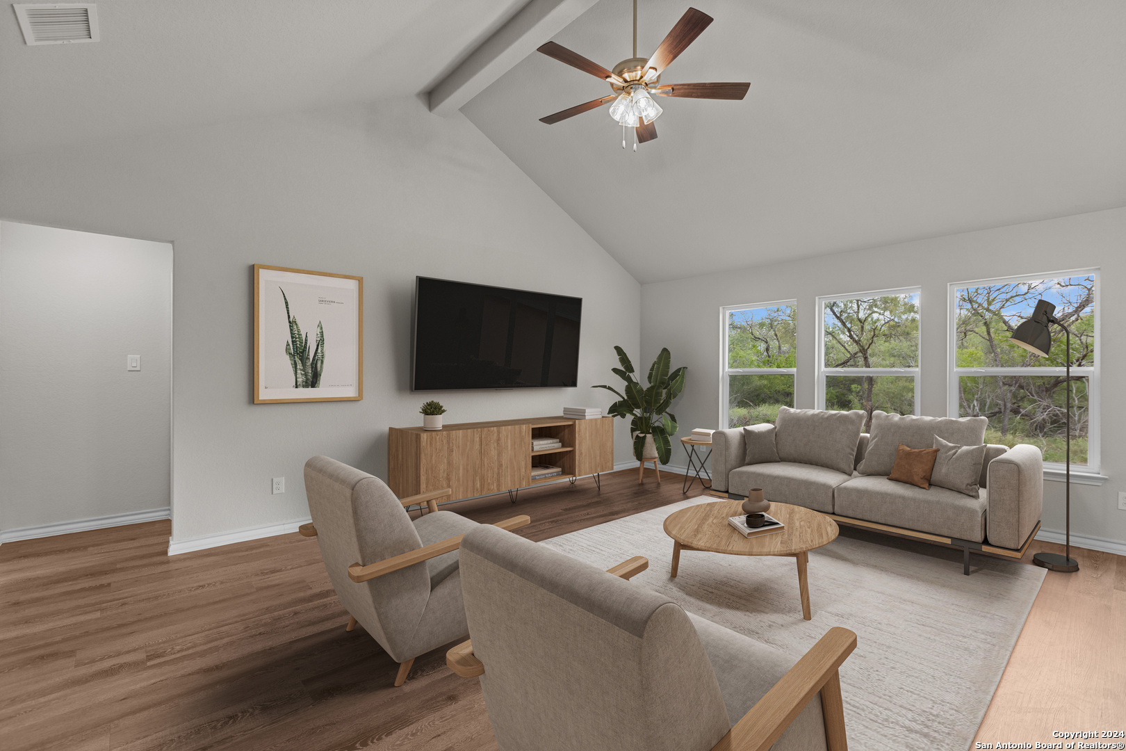 117 Sylas Hayes Loop Pleasanton, TX 78064 - Photo 10 of 38 a living room with furniture and a flat screen tv