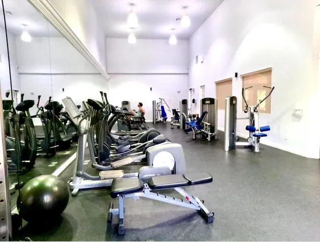 a view of a house with basketball court