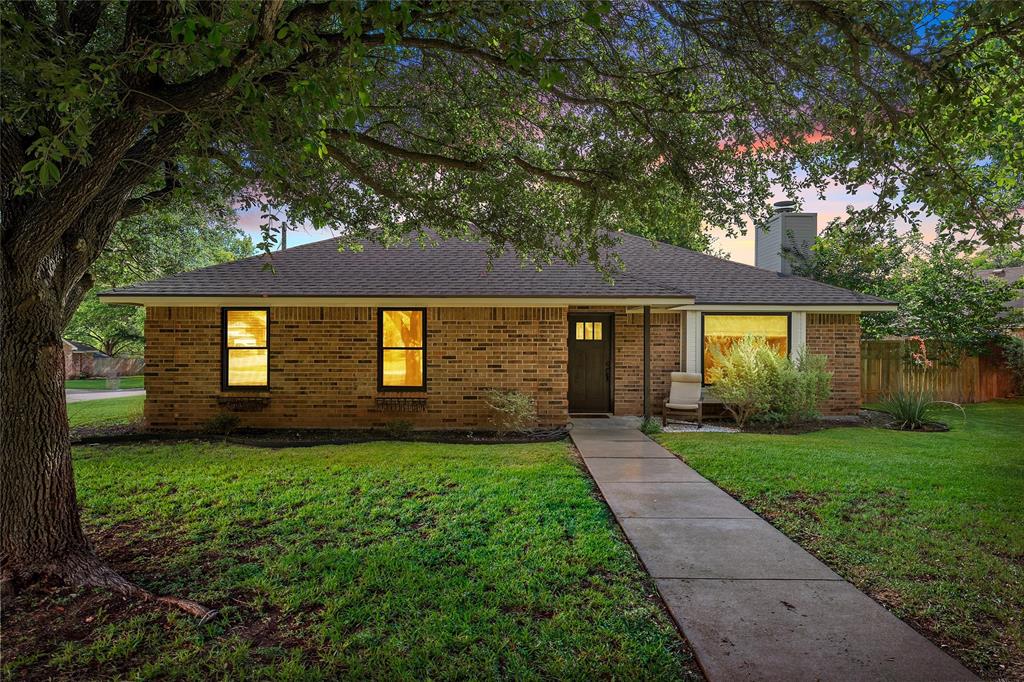310 Ruth Drive Hewitt, TX 76643 - Photo 2 of 25 Brick exterior residence featuring a dark shingle roof and prominent front-facing chimney