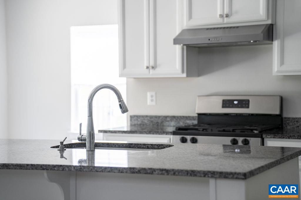 117 Island Hill Road Palmyra, VA 22963 - Photo 14 of 34 a kitchen with a sink and cabinets