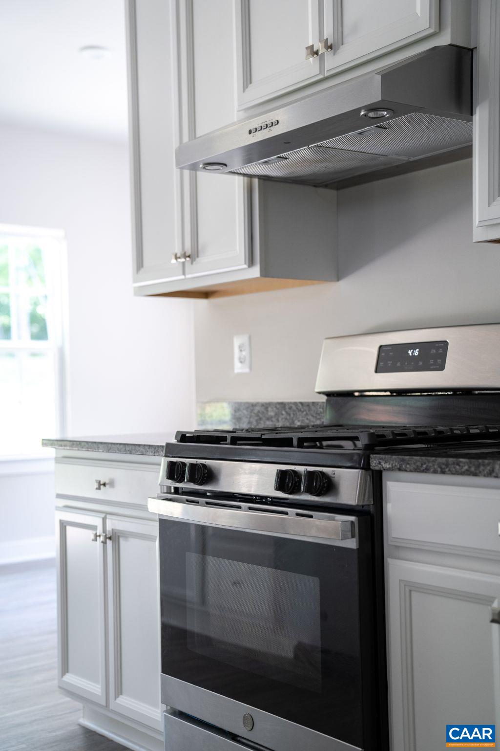 117 Island Hill Road Palmyra, VA 22963 - Photo 16 of 34 a stove top oven sitting inside of a kitchen