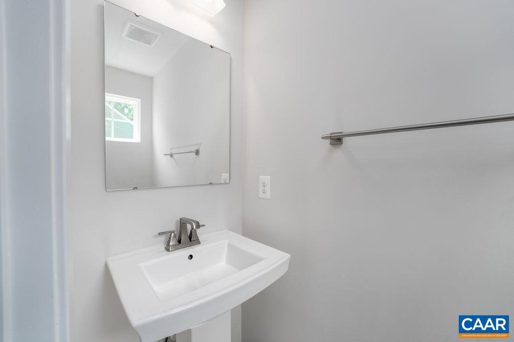 117 Island Hill Road Palmyra, VA 22963 - Photo 19 of 34 a white sink sitting under a bathroom mirror