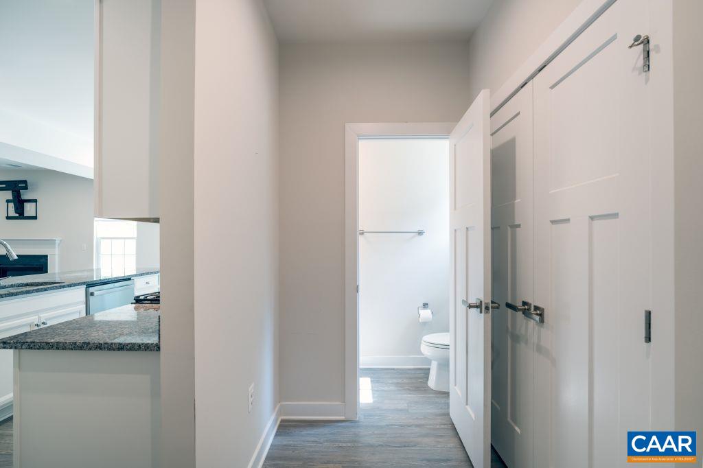 117 Island Hill Road Palmyra, VA 22963 - Photo 20 of 34 a bathroom with a granite countertop sink a toilet and shower