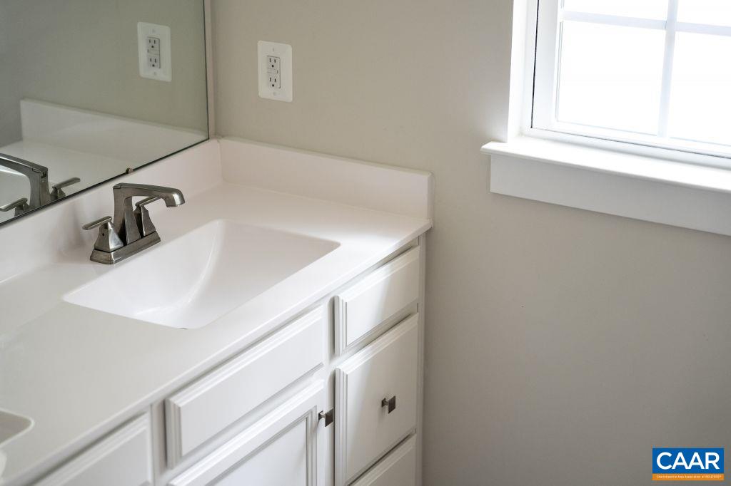 117 Island Hill Road Palmyra, VA 22963 - Photo 26 of 34 a bathroom with a sink and a window