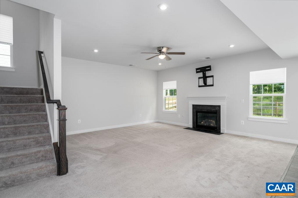 117 Island Hill Road Palmyra, VA 22963 - Photo 9 of 34 a view of an empty room with a fireplace