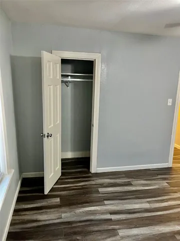 a front view of house with backyard