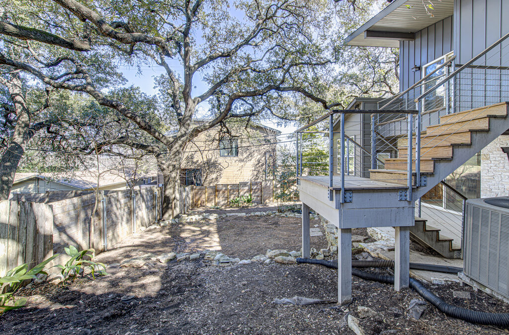 2400 Spring Creek Drive Austin, TX 78704 - Photo 34 of 38 Fenced backyard featuring stairway