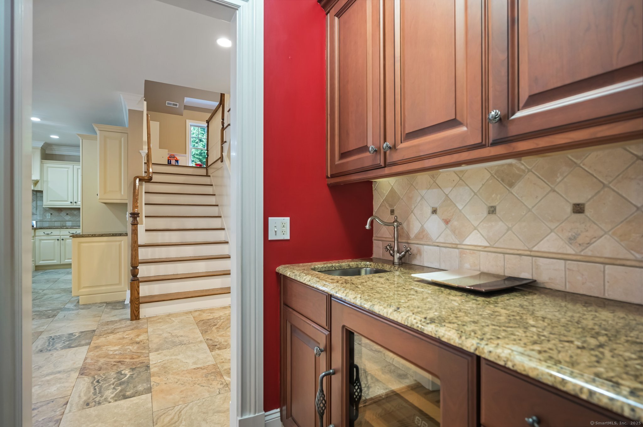 87 Buckingham Ridge Road Wilton, CT 06897 - Photo 12 of 39 a view of a kitchen cabinets and a stove