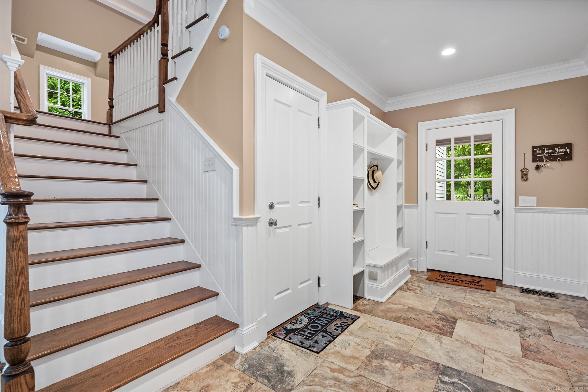 87 Buckingham Ridge Road Wilton, CT 06897 - Photo 13 of 39 a view of a bedroom with wooden floor and windows