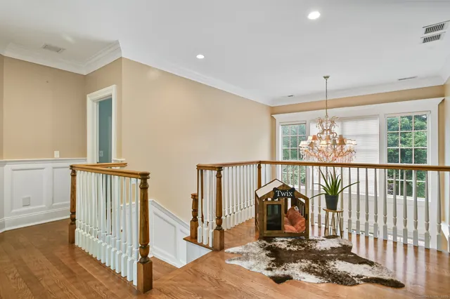 a bedroom with a bed and a fireplace
