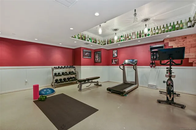 a view of a large white apartments with large windows