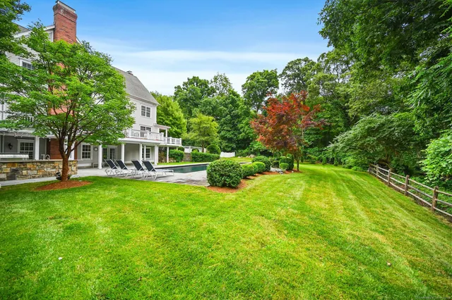 a view of a lake with a yard