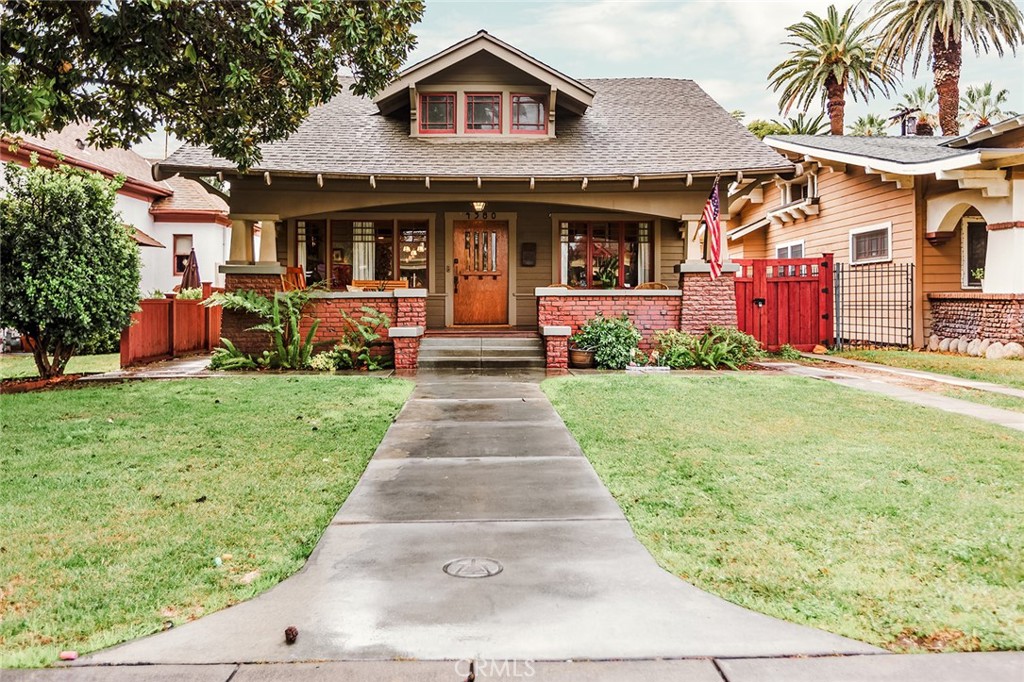 4380 University Avenue Riverside, CA 92501 - Photo 1 of 1 a front view of house with yard and green space