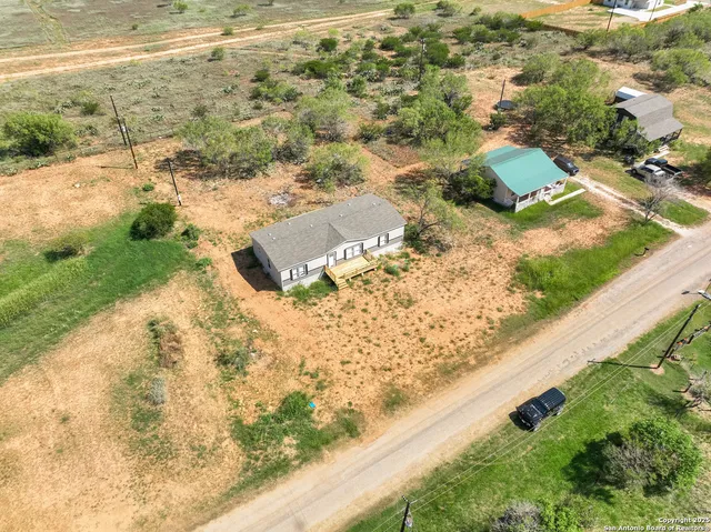 a view of yard with wooden floor