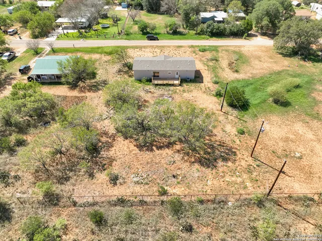 a view of swimming pool with a yard