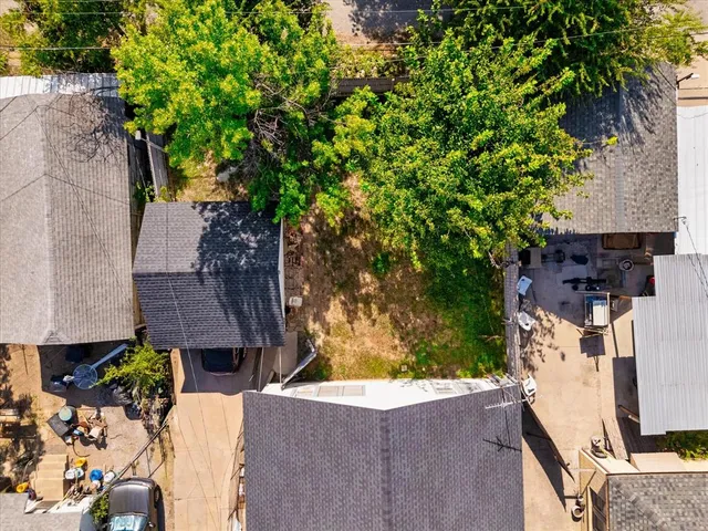 an aerial view of residential house with outdoor space