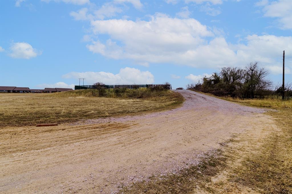 700 South Deer Park Road Decatur, TX 76234 - Photo 22 of 40 View of road featuring a rural view