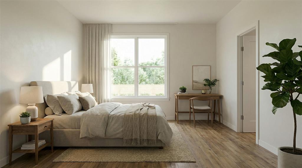 700 South Deer Park Road Decatur, TX 76234 - Photo 32 of 40 Bedroom featuring wood finished floors and baseboards