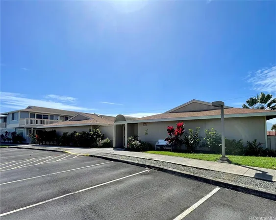 a view of street with cars parked
